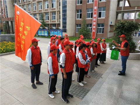 “访千楼万家•创文明城市”玉田职中志愿服务者在行动